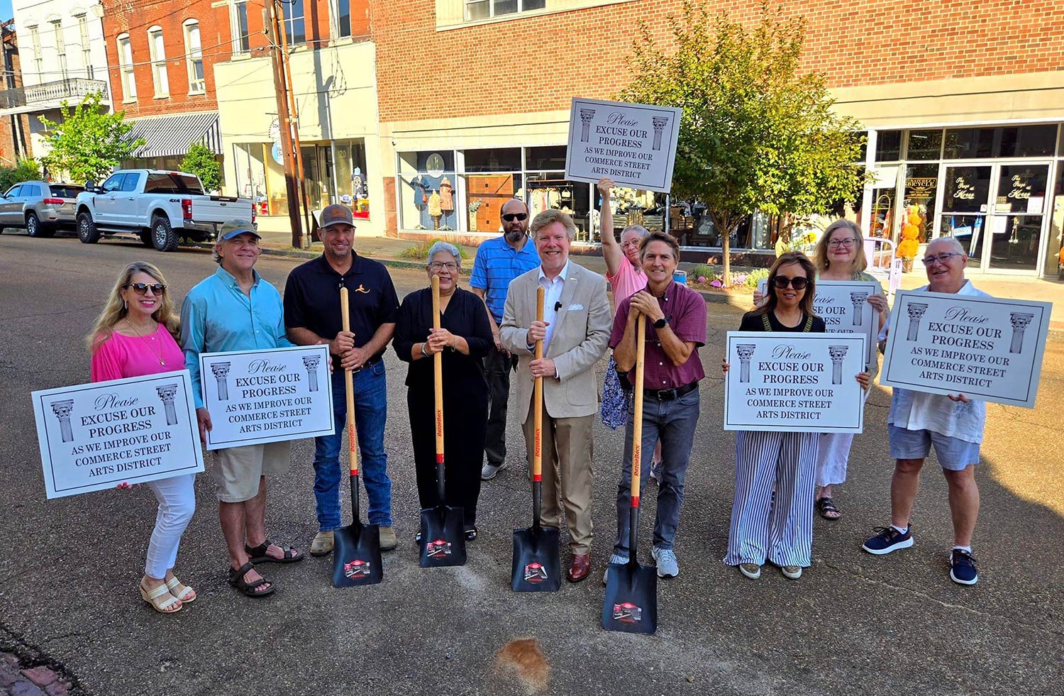 L to R: Mamie Henry (Shops at Kress), Steve Campo (Jacob's Consignment), Travis McCoy (Wildstone Construction Services), Alderwoman Valencia Hall, Mayor Dan Gibson, Alderman Curtis Moroney, Ann Simons (Planet Thailand). Back: City Development Director James Johnston, Carolyn Weir (Artist at Kress), Chesney Doyle (Downtown Natchez Alliance).